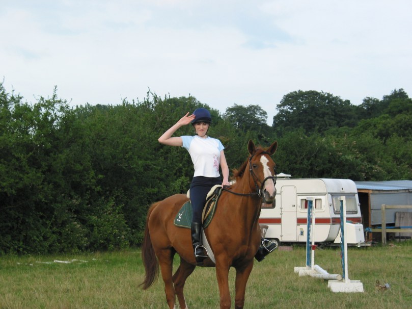 A surprising aytpical choice for riding - navy jodhpurs and a navy hat cover. I could see even back then that black so close to my face wasn't doing me any favours.