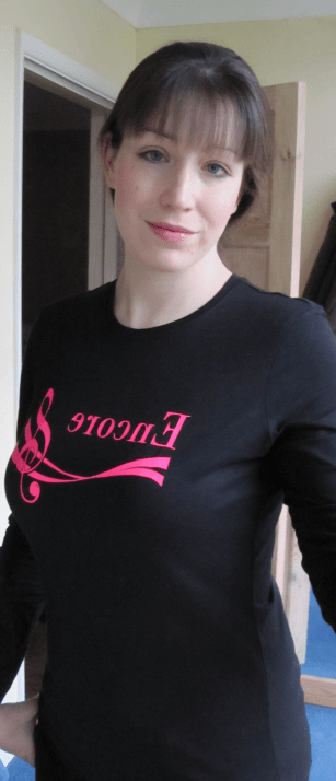 Choir uniform - black. Universally the most unflattering colour. Only 1 in 4 can pull it off, and even fewer look really good in it.